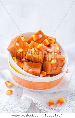 Delicious butterfinger fudge with candy corn and peanut butter