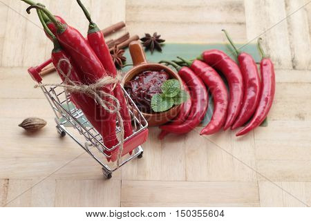 Korean red pepper gochujang for cooking on wood background