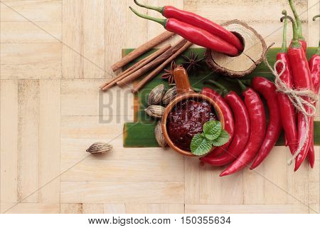 Korean red pepper gochujang for cooking on wood background