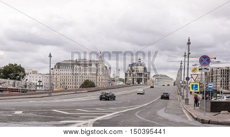 Moscow Russia -September 08 2016: Big Moskvoretsky bridge. On the highway moving pedestrians and cars