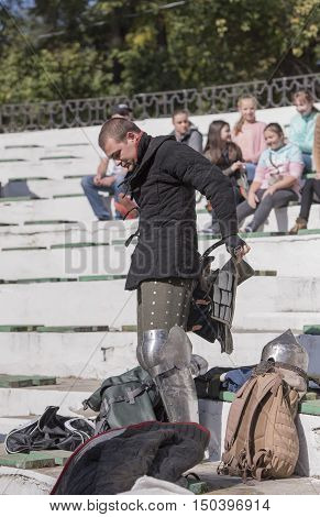 Rostov-on-Don Russia- October 01 2016: Fight knights in the arena of the park W. Cherevichkin.Knight wears armor