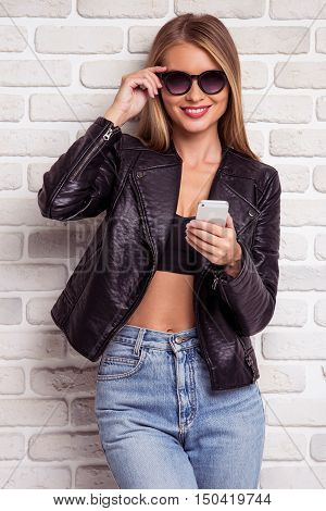 Beautiful Stylish Girl With Gadget