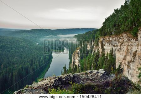 Beautiful summer landscape in the mountains. Sunrise. Russia, Ural, Usva Pillars