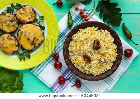 Italian Pasta (spaghetti) with dried porcini mushrooms and Parmesan. Serve with baked stuffed champignons