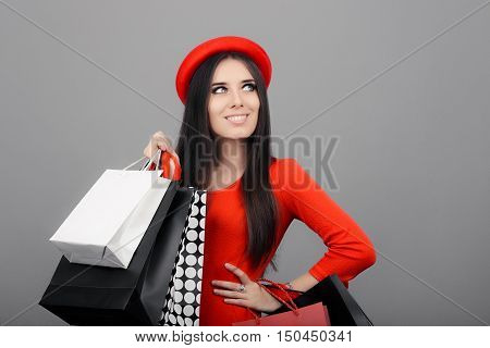 Happy Fashionable Woman Wearing Red Dress Holding Shopping Bags
