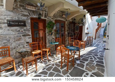 NAXOS, GREECE - SEPTEMBER 22, 2016: Caffee shop in the old town of Naxos on September 22, 2016.