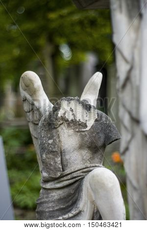 Old statues on the graves and gravestones in the Lychakiv Cemetery