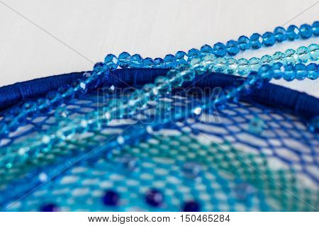 set for making a Dreamcatcher beads thread on a white background
