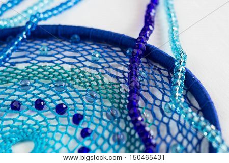 set for making a Dreamcatcher beads thread on a white background