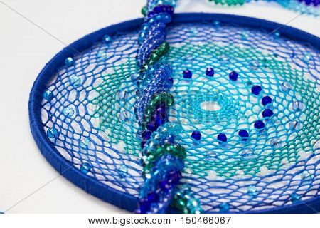 set for making a Dreamcatcher beads thread on a white background
