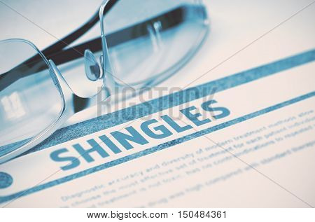 Shingles - Medicine Concept on Blue Background with Blurred Text and Composition of Glasses. Shingles - Medical Concept with Blurred Text and Specs on Blue Background. Selective Focus. 3D Rendering.