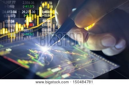 Graph Of Stock Market Data And Financial With The View From Led Display Concept That Suitable For Ba