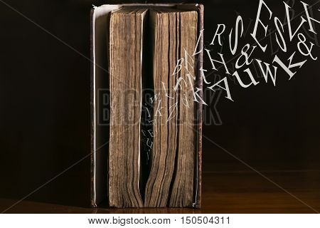 Text Flying out of an old book