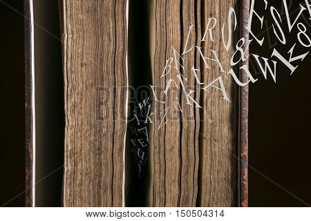 Text Flying out of an old book