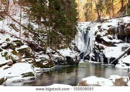 winter waterfall Szklarka in Poland karkonosze national park