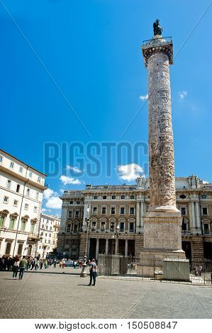 Trajan column in Rome. Blue sky and white clouds in background