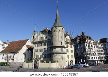LUCERNE SWITZERLAND - MAY 5 2016: Haus zur Gilgen one of the oldest stone houses in the city and it is located on the right bank of the river Reuss.