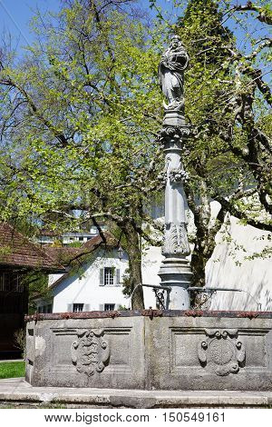 LUCERNE SWITZERLAND - MAY 06 2016: Mary's fountain probably dates back from the late 17th century and is located by the Church of St. Leodegar