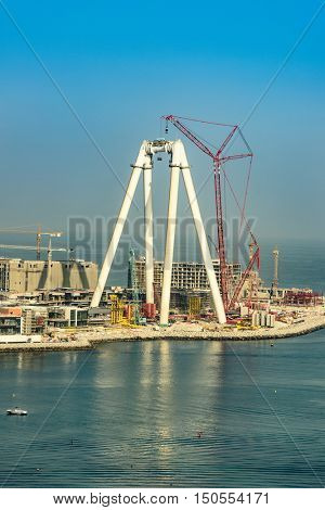 Dubai, UAE - OCTOBER 06, 2016: Bluewaters island construction in Dubai, UAE on October 06, 2016. Located off Jumeirah Beach Residence it will be the world's largest Ferris wheel, The Dubai Eye.