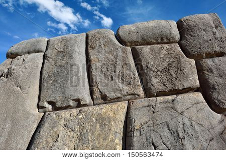 Inca wall in the village Saksaywaman Peru South America