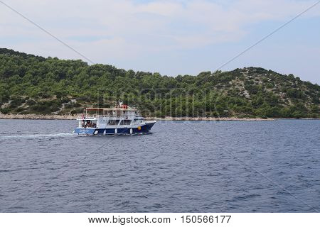 DUGI OTOK, CROATIA - SEPTEMBER 7, 2016: There is boat trip on a boat 