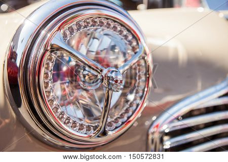 Close-up photo of retro car headlights. Old vintage car