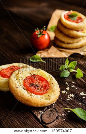 Mini Pizzas With Camembert And Tomato