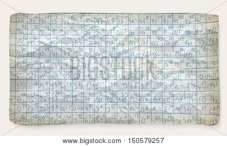 Crumpled graph paper and hand written numbers
