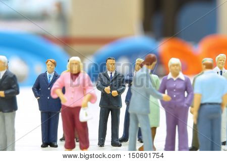 Small Figures Of Business Meeting