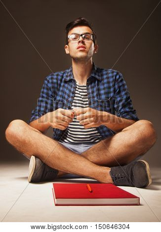 Education. Young male student preparing for exams.(self-development learning success)