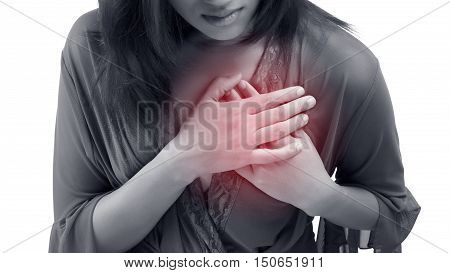 Woman is clutching her chest acute pain possible heart attack