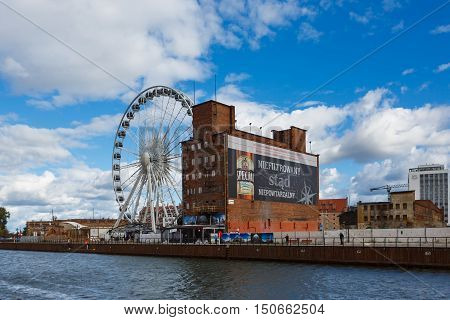 Gdansk Poland - October 04 2016: Ferris wheel on the Motlawa River waterfront in old city of Gdansk