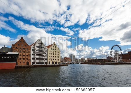 Gdansk Poland - October 04 2016: Old historic buildings of the old city on the Motlawa River waterfront in Gdansk