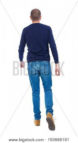Back view of going  handsome man. walking young guy . Rear view people collection.  backside view of person.  Isolated over white background. Man in warm jacket goes away.
