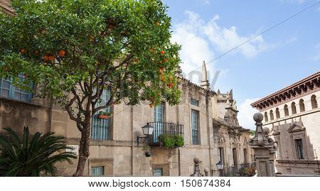 BarcelonaSpain - January 13 2016: Spanish town (Poble Espanyol) - architectural museum under the open sky. The museum features exhibits on contemporary art with streets houses parks theater school restaurants and artisan workshops.