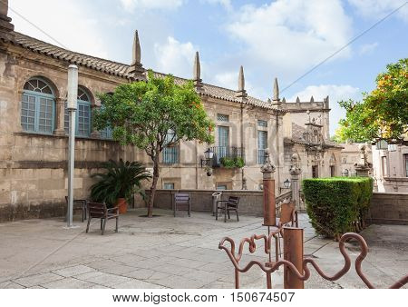 BarcelonaSpain - January 13 2016: Spanish town (Poble Espanyol) - architectural museum under the open sky. The museum features exhibits on contemporary art with streets houses parks theater school restaurants and artisan workshops.