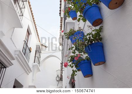 BarcelonaSpain - January 13 2016: Spanish town (Poble Espanyol) - architectural museum under the open sky. The museum features exhibits on contemporary art with streets houses parks theater school restaurants and artisan workshops.