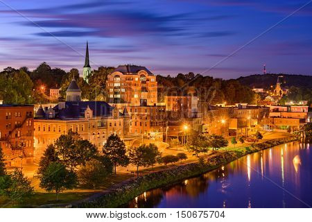 Augusta, Maine, USA downtown skyline on the Kennebec River.