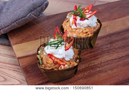 Streamed vegetable curry in banana leaf cup call 