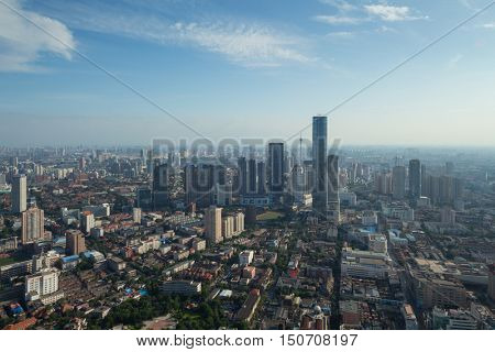 Tianjin city in summer sunny day, China, view from Financial Street Heping Center