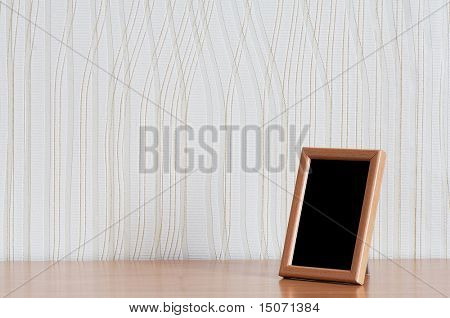 photo frame on wooden table