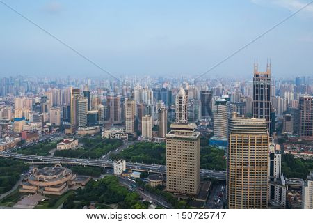 SHANGHAI - AUG 7, 2015: Tomorrow square among high buildings, 990 skyscrapers are in Shanghai