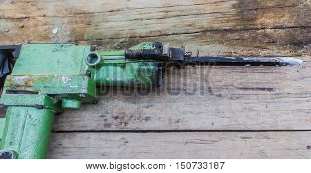 Electric hammer Plugger. on the old wood