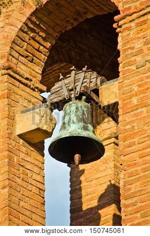 brick tower with bells ringing to tell the time