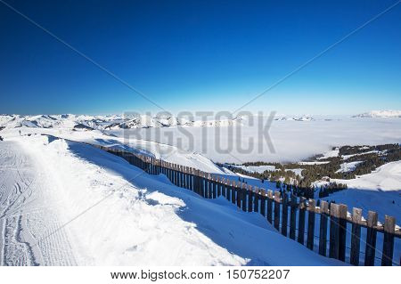 View To Alpine Mountains In Austria From Kitzbuehel Ski Resort - One Of The Best Ski Resort In The W