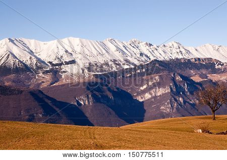 Monte Baldo (Baldo Mountain) 2218 m. in winter near Verona seen from the Plateau of Lessinia. Veneto Italy