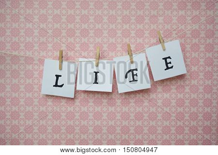 White Sheets Of Paper On A Pink Background, White Sheets On Clothespins