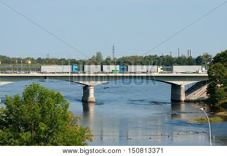 NARVA, ESTONIA - AUGUST 21, 2016: Bridge of Friendship over The Narva (Narova) River between Narva Town in Estonia and Ivangorod in Russia. Here is the border of two countries. View from Estonian side
