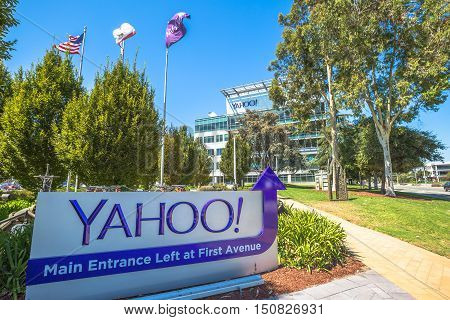 Sunnyvale, California, United States - August 15, 2016: Yahoo Headquarters with American Flag and Yahoo icon.Yahoo is a company providing internet services founded in 1994 by David Filo and Jerry Yang
