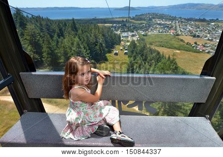 Young Girl Travel On Skyline Gondola